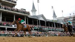 Jockey John Valazquez, riding Animal Kingdom #16, leads the field across the finish line to win the 137th Kentucky Derby at Churchill Downs on May 7, 2011 in Louisville, Kentucky.