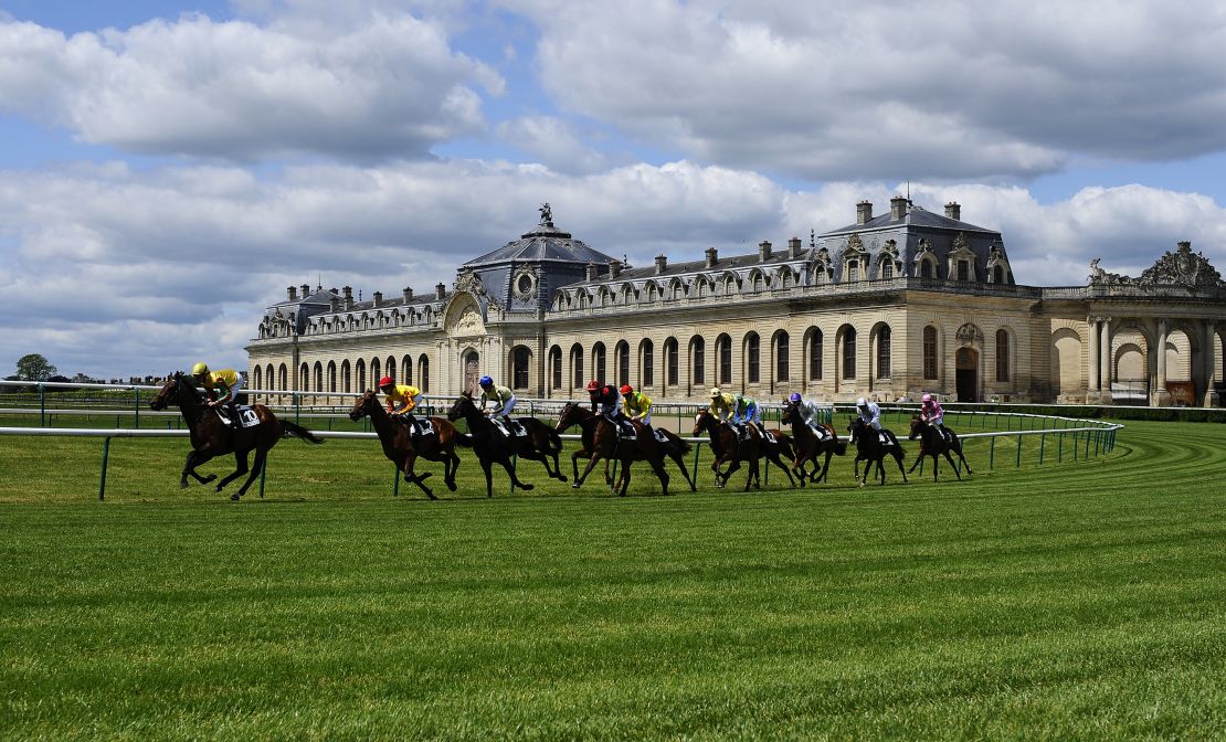 Chantilly racecourse features views of a chateau and the famous Great Stables (pictured).