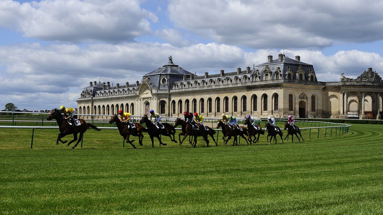 Chantilly racecourse features views of a chateau and the famous Great Stables (pictured).