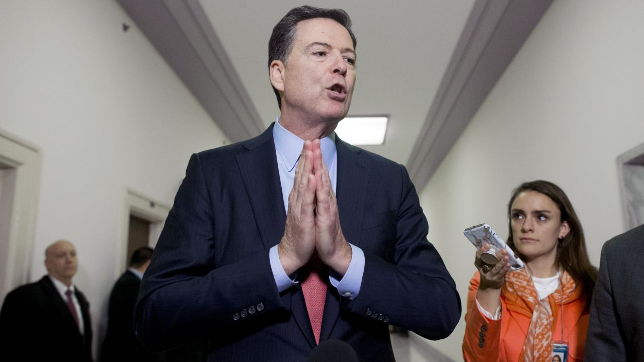 Former FBI Director James Comey talks to the media after <a href="https://www.cnn.com/2018/12/17/politics/james-comey-congress-fbi/index.html" target="_blank">testifying before House committees in Washington</a> on Tuesday, December 18. He was questioned on the FBI's handling of both the Hillary Clinton email investigation and the Russia investigation. 