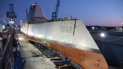 The future US stealth destroyer, USS Lyndon B. Johnson, is made ready before flooding of the dry dock in Maine in December.