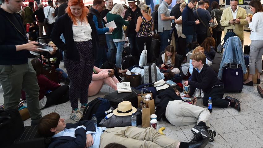 Passengers wait at the North Terminal at London Gatwick Airport, south of London, on December 20, 2018 after all flights were grounded due to drones flying over the airfield. - London Gatwick Airport was forced to suspend all flights on December 20 due to drones flying over the airfield, causing misery for tens of thousands of stuck passengers just days before Christmas. (Photo by Glyn KIRK / AFP)        (Photo credit should read GLYN KIRK/AFP/Getty Images)