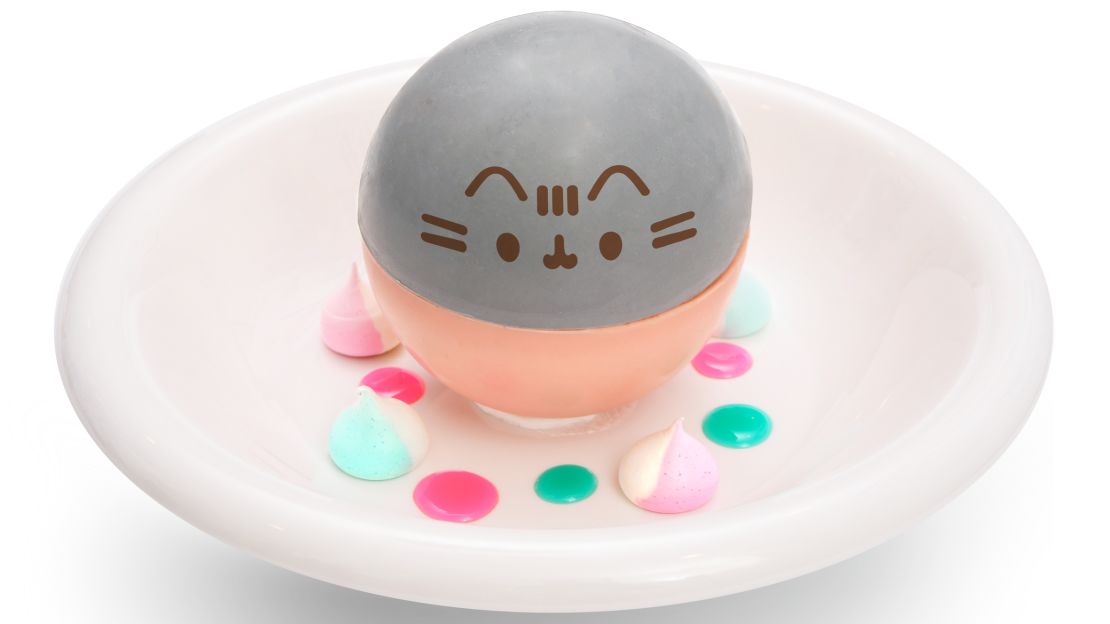 This Pusheen dessert has extra treats inside.