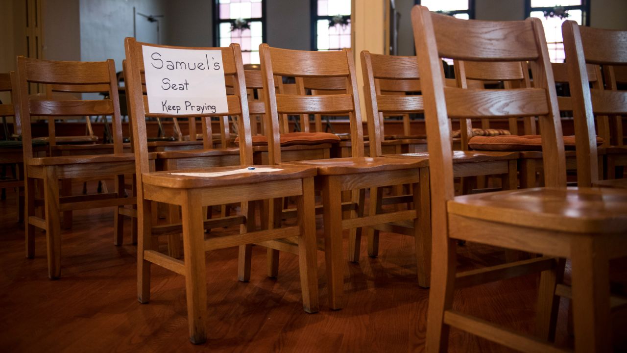 A sign marks the chair where Samuel Oliver-Bruno used to sit during services at CityWell United Methodist Church. The Rev. Cleve May says his congregation is grieving, but not giving up. "The story of God in this world is God showing up in the midst of injustice and oppression," he says.