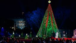 President Donald Trump and first lady Melania Trump light the National Christmas Tree on the Ellipse near the White House in Washington, Wednesday, November 28.