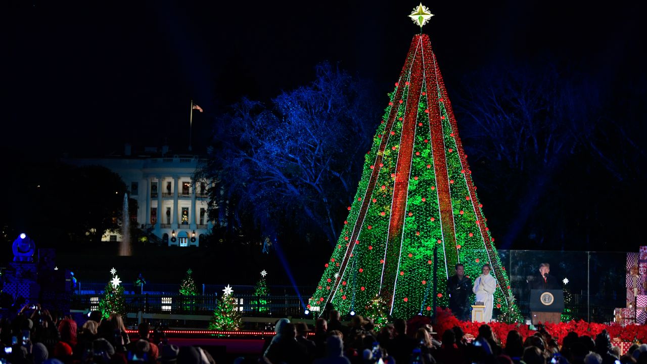 President Donald Trump and first lady Melania Trump light the National Christmas Tree on the Ellipse near the White House in Washington, Wednesday, November 28.