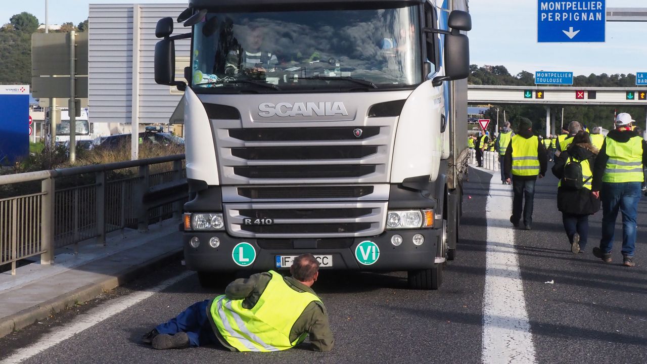 "Yellow vest" protesters turn out Saturday near toll booths on the A9 highway in Le Boulou, France.
