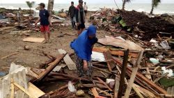 Residents inspect the damage to their homes on Carita beach on December 23, 2018, after the area was hit by a tsunami on December 22 that may have been caused by the Anak Krakatoa volcano. - At least 43 people have been killed and nearly 600 injured in a tsunami in Indonesia that may have been caused by a volcano known as the "child" of the legendary Krakatoa, officials said on December 23. Hundreds of buildings were destroyed by the wave, which hit beaches without warning in South Sumatra and the western tip of Java about 9.30 pm local time (1430 GMT) on December 22, national disaster agency spokesman Sutopo Purwo Nugroho said in a statement. (Photo by Semi / AFP)        (Photo credit should read SEMI/AFP/Getty Images)