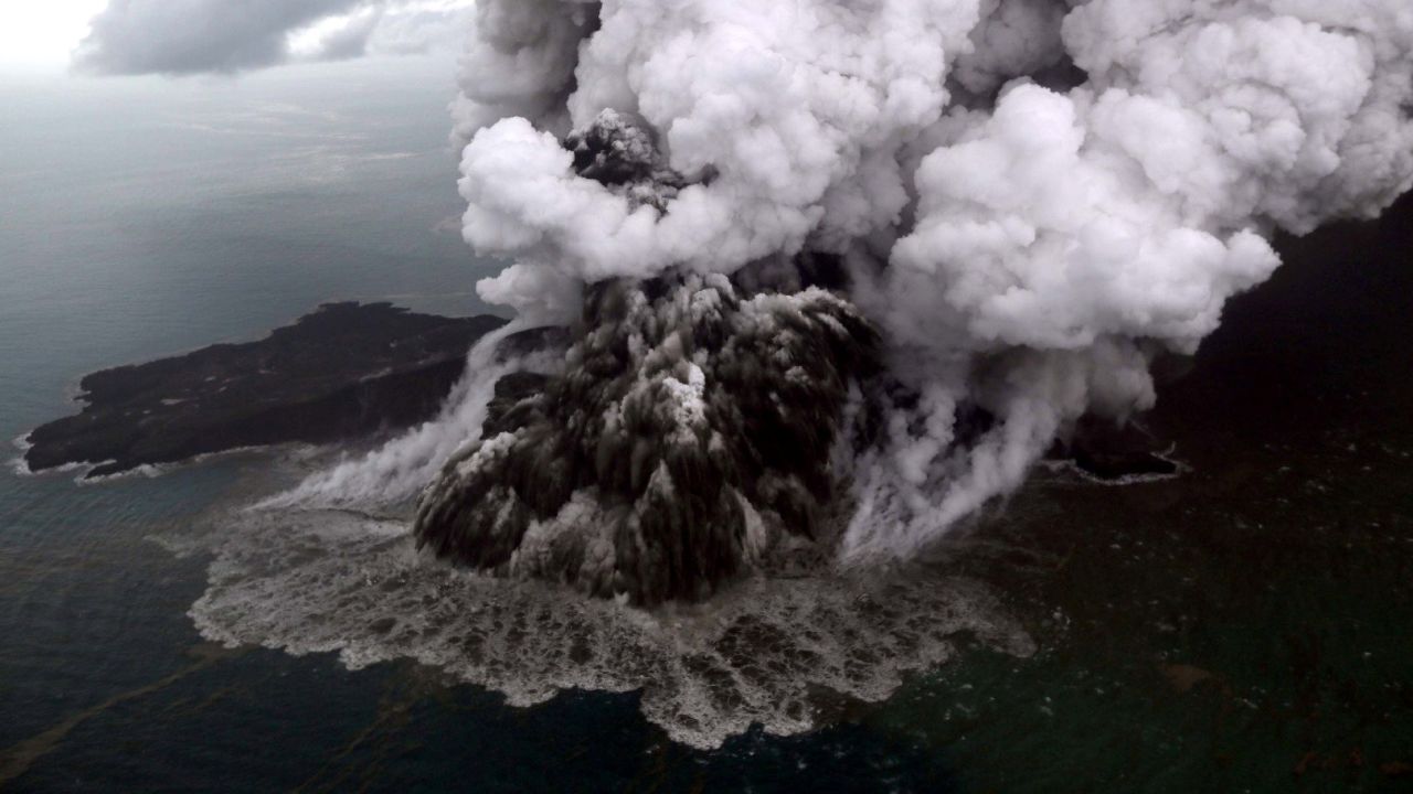 An aerial view of the Anak Krakatau volcano during an eruption in South Lampung, Indonesia, on Sunday, December 23. The tsunami is believed to have been triggered when the volcano, lying in the Sunda Strait between the islands of Java and Sumatra, erupted and set off a series of underwater landslides, according to Indonesia's Meteorology, Climatology and Geological Agency.