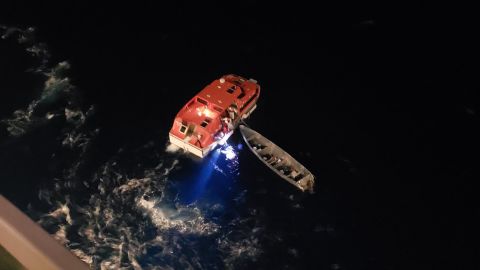 Two mariners were stranded aboard this gray vessel for 20 days, a Royal Caribbean spokesman said.