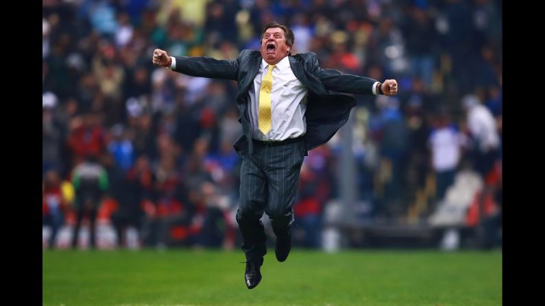 Club América coach Miguel Herrera celebrates after a match between Cruz Azul and Club América at Azteca Stadium on December 16, 2018 in Mexico City, Mexico. Club América won the match 2-0.