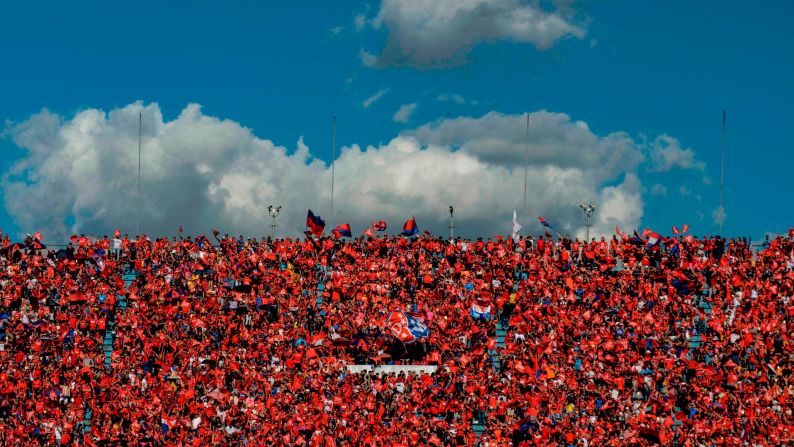 Fans of Independiente Medellin cheer before the Colombian League football final between Atletico Junior and Independiente Medellin at Atanasio Girardot Sports Complex, in Medellin, Colombia on December 16