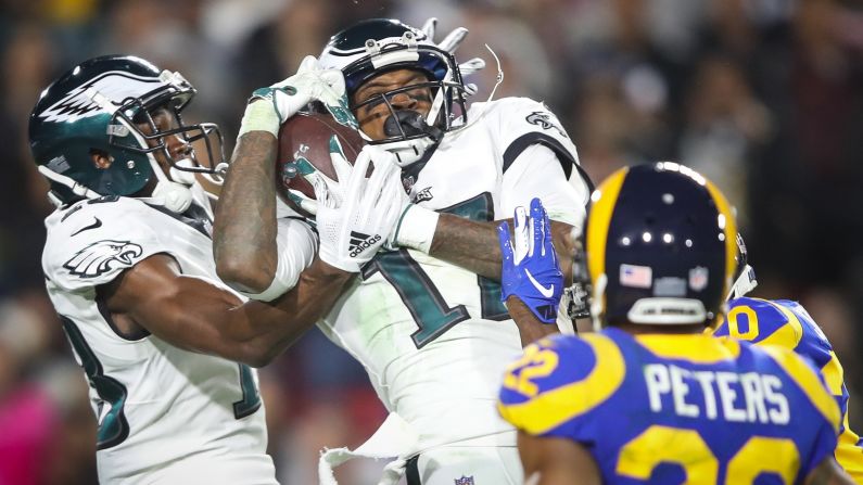 Wide receiver Alshon Jeffery of the Philadelphia Eagles collides with his teammate while making a first-down catch in the third quarter of their game against the Los Angeles Rams at Los Angeles Memorial Coliseum on December 16. <a href="index.php?page=&url=https%3A%2F%2Fwww.cnn.com%2F2018%2F12%2F17%2Fsport%2Fgallery%2Fwhat-a-shot-sports-1216%2Findex.html" target="_blank">See 31 amazing sports photos from last week.</a>