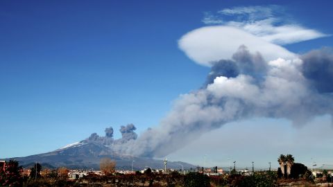 Smoke rises over the city of Catania during an eruption of Mount Etna on Monday.