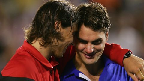 Rafael Nadal (left) consoles Roger Federer after the Spaniard won the 2009 Australian Open.