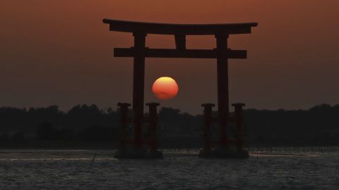 <strong>Hamamatsu, Japan:</strong> Visitors come to Bentenjima Island from mid-November to mid-January, when the setting sun is framed by the torii gate, creating marvelous shots like this one. Click through the gallery for the rest of the best travel photos of 2018:<br />