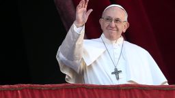VATICAN CITY, VATICAN - DECEMBER 25: Pope Francis waves to the faithful as he delivers his Christmas 'Urbi et Orbi' blessing message from the central balcony of St Peter's Basilica on December 25, 2018 in Vatican City, Vatican. The Blessing 'Urbi et Orbi' (to the city and to the world) is recognised as a Christmas tradition by Catholics. (Photo by Franco Origlia/Getty Images)