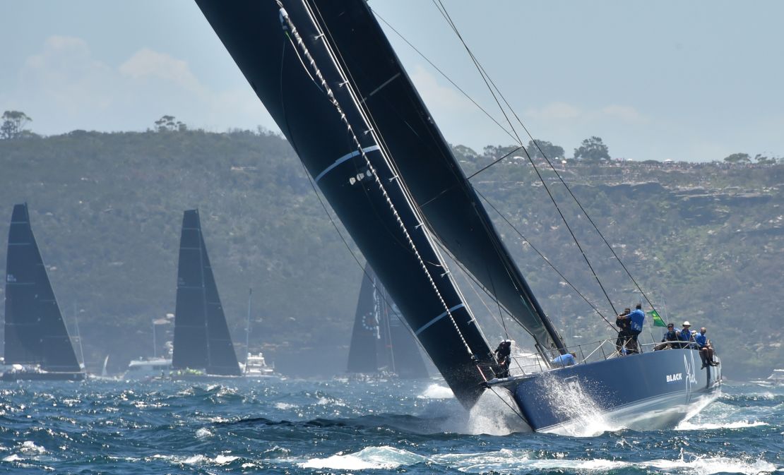 Australian supermaxi Black Jack led the 85-strong fleet out of Sydney Harbor at the start of the 74th staging of the Sydney to Hobart yacht race on Boxing Day. 