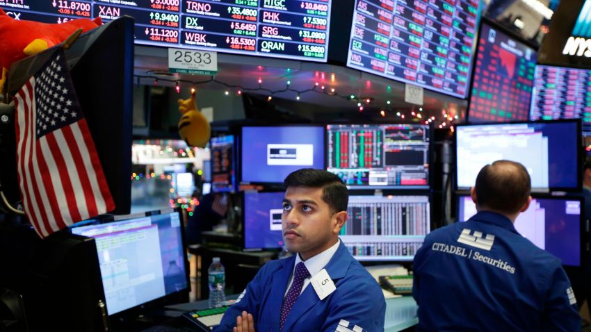 Traders work on the floor of the New York Stock Exchange in New York, Monday, Dec. 24, 2018. (AP Photo/Seth Wenig)