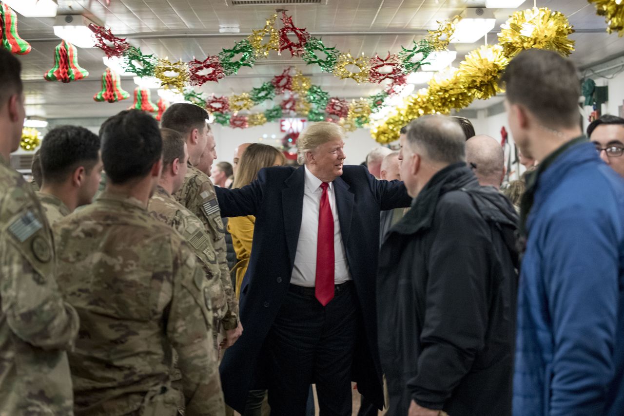President Trump mingles with the troops.