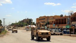 Vehicles of the US-led coalition battling the Islamic State group patrol the town of Rmelane in Syria's Hasakeh province on June 5, 2018. - The leading Syrian Kurdish militia said it would withdraw from Manbij, easing fears of a direct clash between NATO allies Washington and Ankara over the strategic northern town. Manbij is a Sunni Arab-majority town that lies just 30 kilometres (19 miles) south of the Turkish border, and where US and French troops belonging to the Western coalition against IS are stationed. (Photo by Delil souleiman / AFP)        (Photo credit should read DELIL SOULEIMAN/AFP/Getty Images)