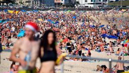 Beachgoers celebrate Christmas at Bondi Beach in Sydney, Tuesday, Dec. 25, 2018. (Mick Tsikas/AAP Image via AP)