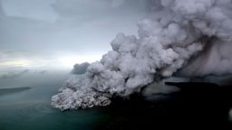 TOPSHOT - This aerial picture taken on December 23, 2018 by Bisnis Indonesia shows the Anak (Child) Krakatoa volcano erupting in the Sunda Straits off the coast of southern Sumatra and the western tip of Java. - The death toll from the December 22 volcano-triggered tsunami in Indonesia has risen to 281, with more than 1,000 people injured, the national disaster agency said on December 24, as the desperate search for survivors ramped up. (Photo by Nurul HIDAYAT / BISNIS INDONESIA / AFP)        (Photo credit should read NURUL HIDAYAT/AFP/Getty Images)