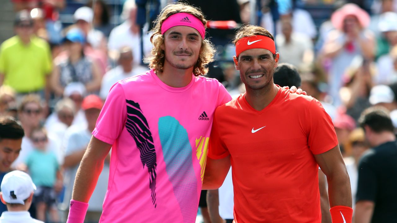 Rafael Nadal (right) poses with Greece's rising star Stefanos Tsitsipas, 20.