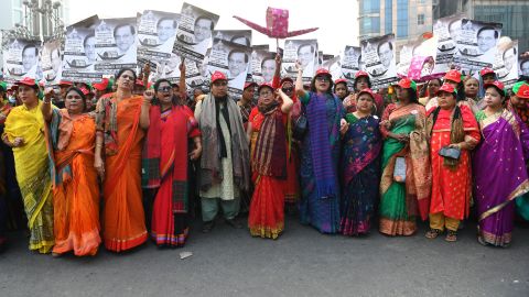 Supporters of the Bangladesh Awami League shout slogans while taking part in a rally ahead of December 30 general election vote, in Dhaka on December 27, 2018.