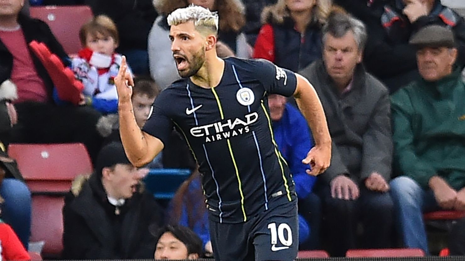 Manchester City's Argentinian striker Sergio Aguero celebrates after scoring its third goal during the English Premier League football match against Southampton at St Mary's Stadium.