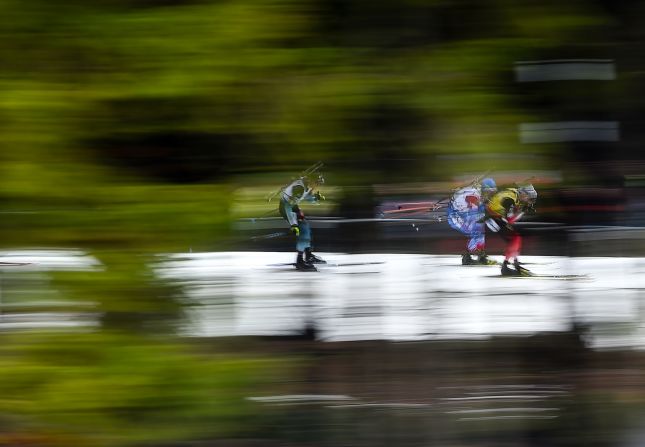 Norway's Johannes Thingnes Boe, right, leads a pack during the men's 15 kilometer mass start competition of the IBU World Cup Biathlon in Nove Mesto, Czech Republic on December 23.