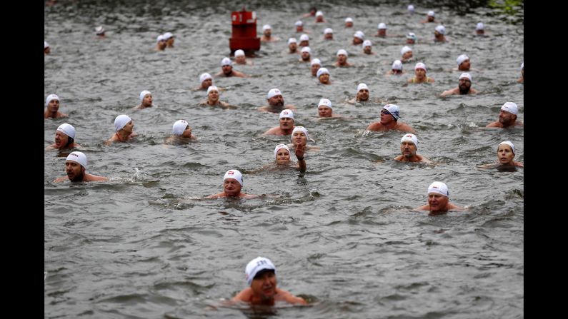 Polar swimmers participate in a traditional Christmas swim in the Vltava River in Prague, Czech Republic, on December 26. 