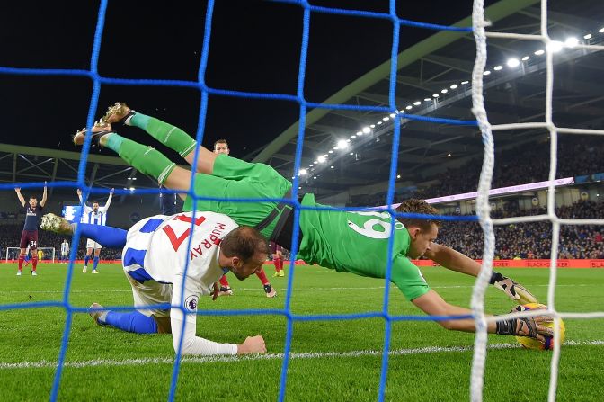 Arsenal's Bernd Leno saves the ball on the goal line during a match against Brighton & Hove Albion on December 26 in Brighton, England.  