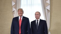 US President Donald Trump (L) and Russia's President Vladimir Putin pose ahead a meeting in Helsinki, on July 16, 2018. (Photo by Alexey NIKOLSKY / Sputnik / AFP) 