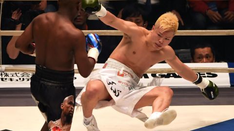 US boxing legend Floyd Mayweather Jr knocks down Japanese opponent Tenshin Nasukawa in their exhibition bout in Saitama on New Year's Eve.