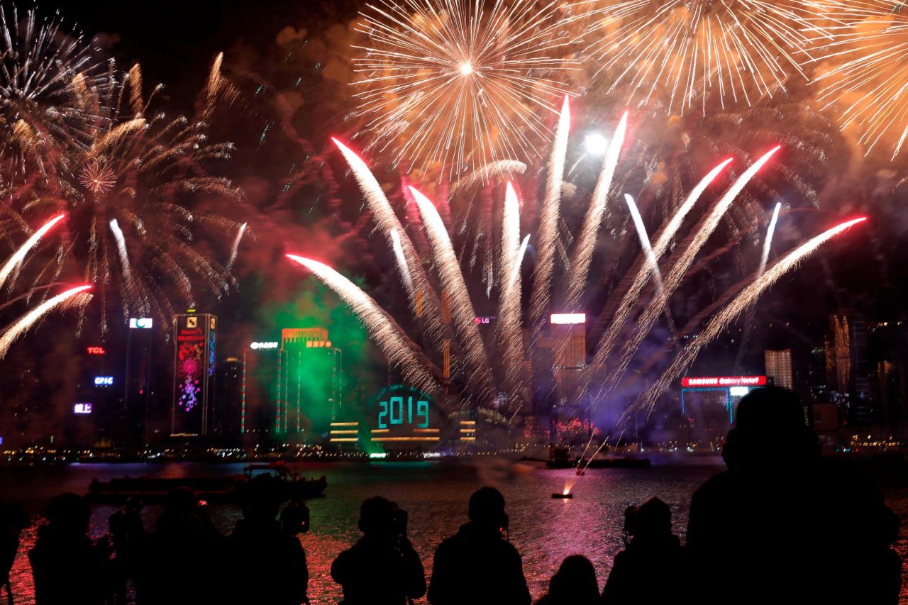 Fireworks explode over Victoria Harbour in Hong Kong.