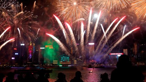 Fireworks explode over Victoria Harbour in Hong Kong.