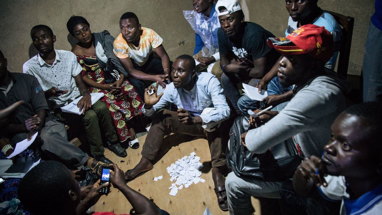 Improvised electoral agents count ballots after a symbolic vote on December 30, 2018, at Kalinda Stadium in Beni, where voting in the general election was postponed.