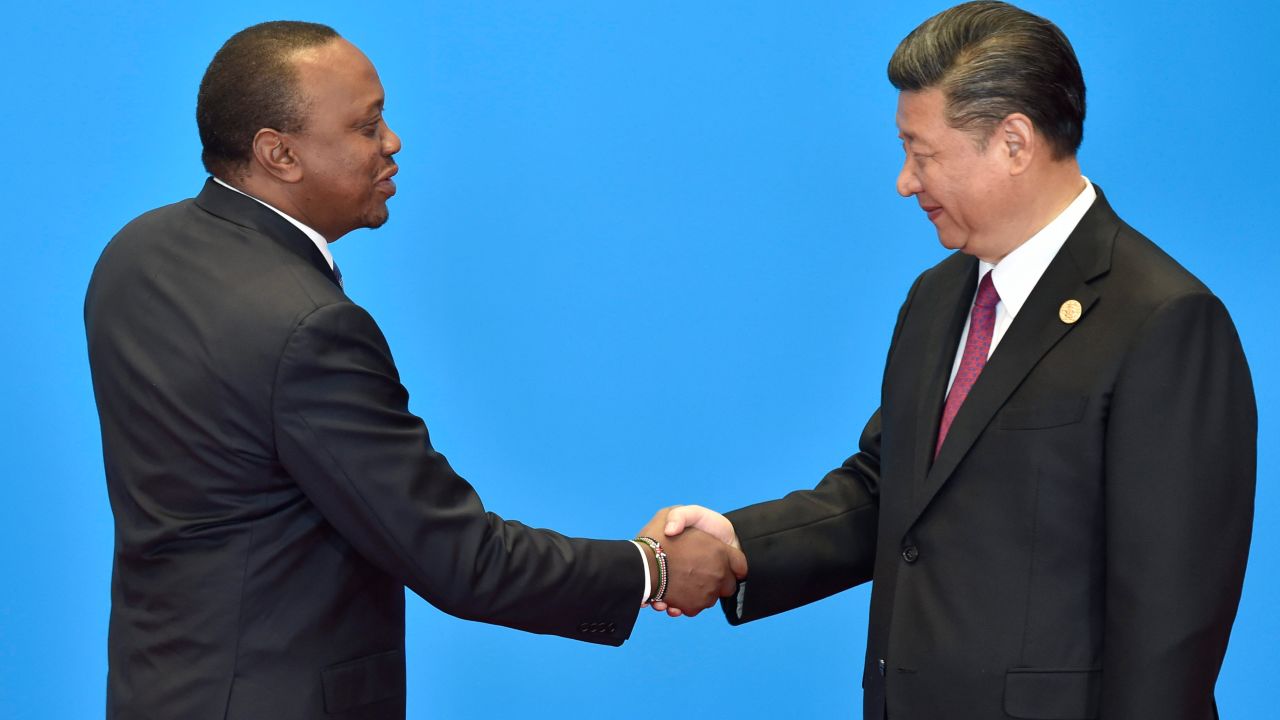 Kenya's President Uhuru Kenyatta (left) shakes hands with Chinese President Xi Jinping during the welcome ceremony for the Belt and Road Forum, near Beijing in May 2017.