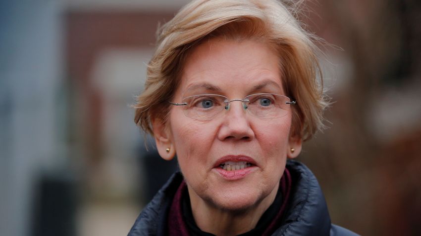 U.S. Senator Elizabeth Warren (D-MA) speaks to reporters, after announcing she has formed an exploratory committee to run for president in 2020, outside her home in Cambridge, Massachusetts, U.S., December 31, 2018. REUTERS/Brian Snyder