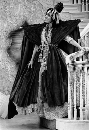 Burnett wears a dress made from a window curtain as she parodies "Gone With the Wind" during a "Carol Burnett Show" episode in 1976.