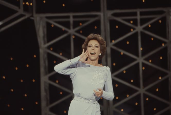 Burnett performs a Tarzan yell, which she would often do during her show's question-and-answer sessions.