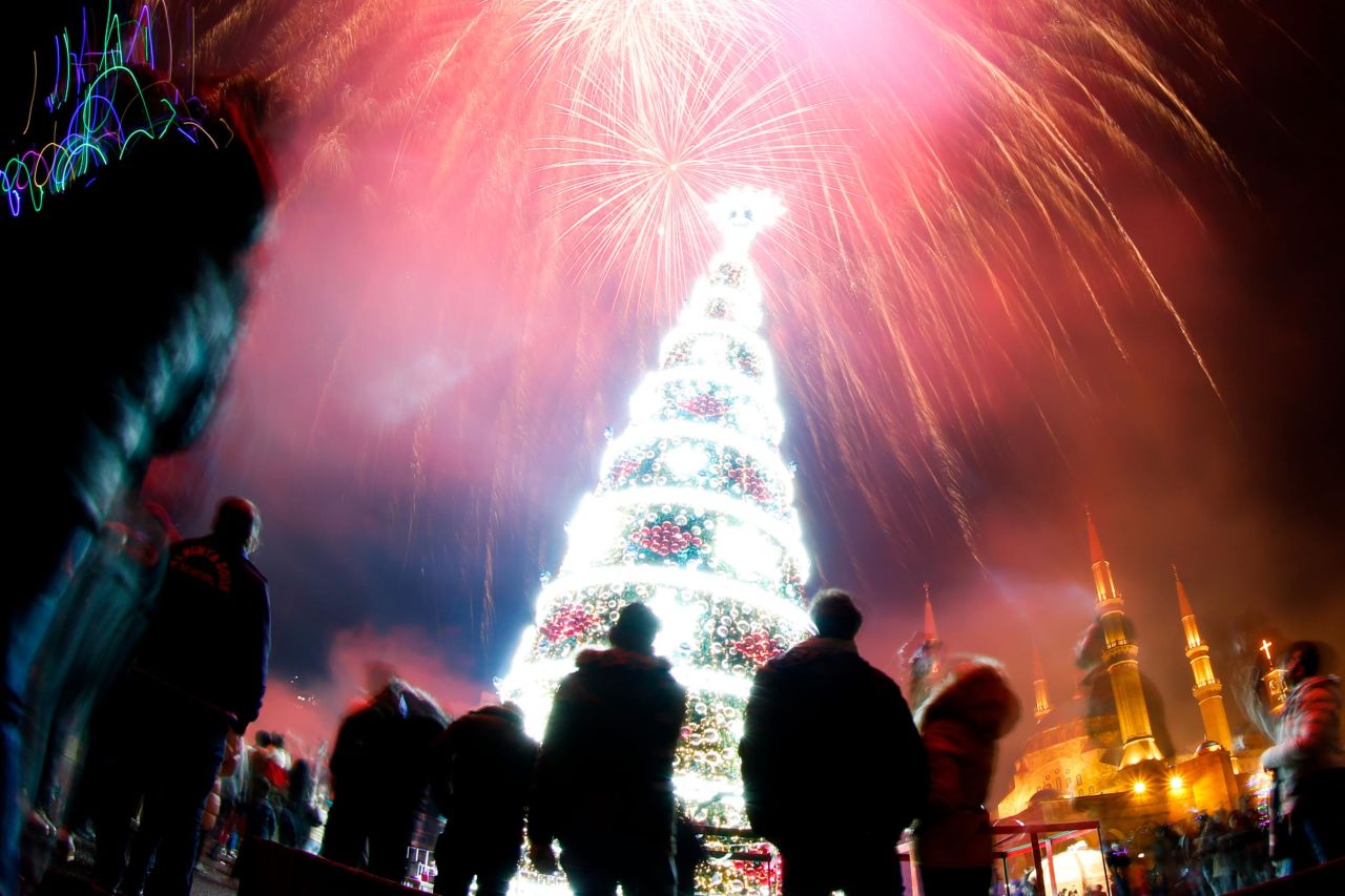 Fireworks explode over Martyrs Square in downtown Beirut, Lebanon.