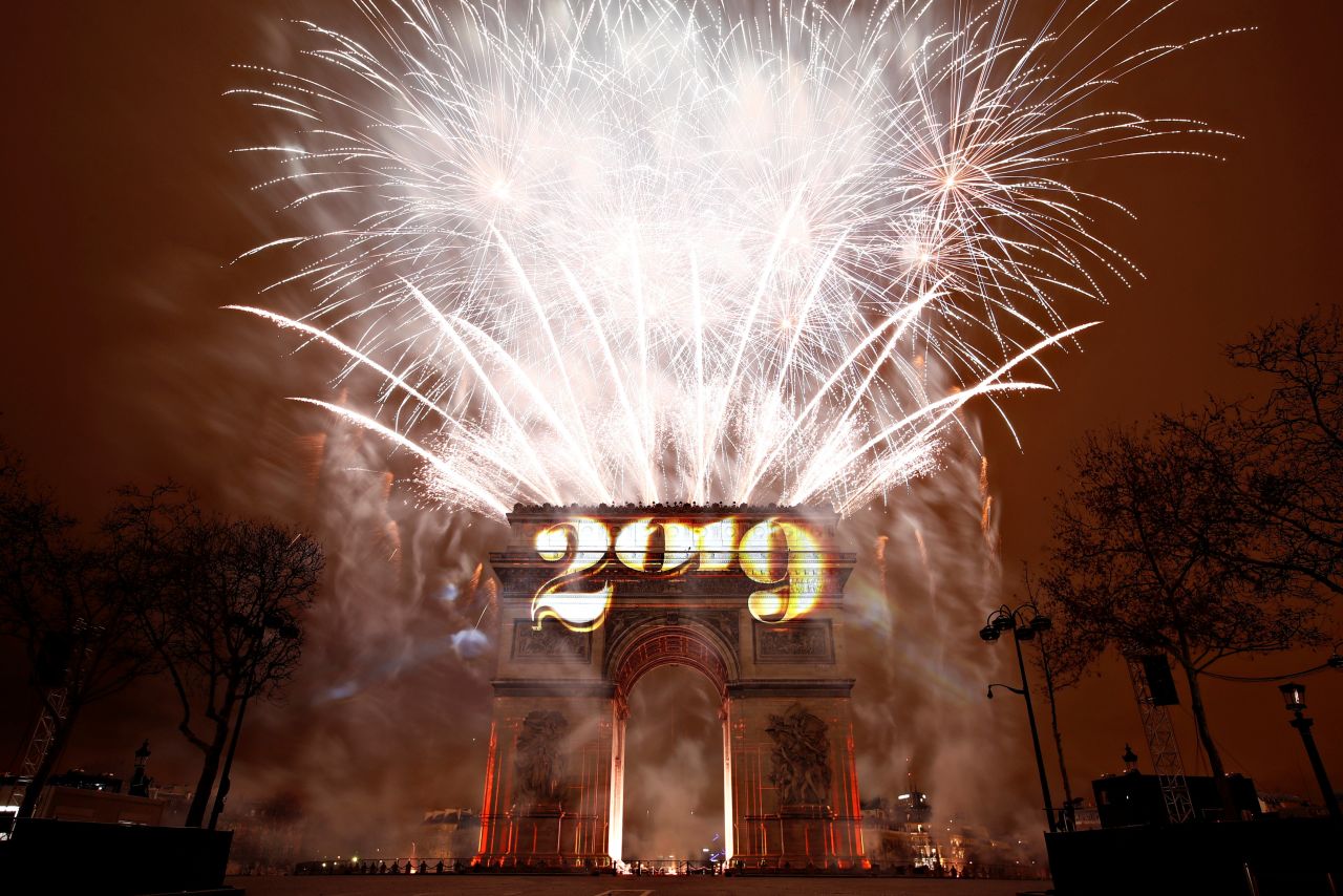 Fireworks explode at the Arc de Triomphe in Paris.