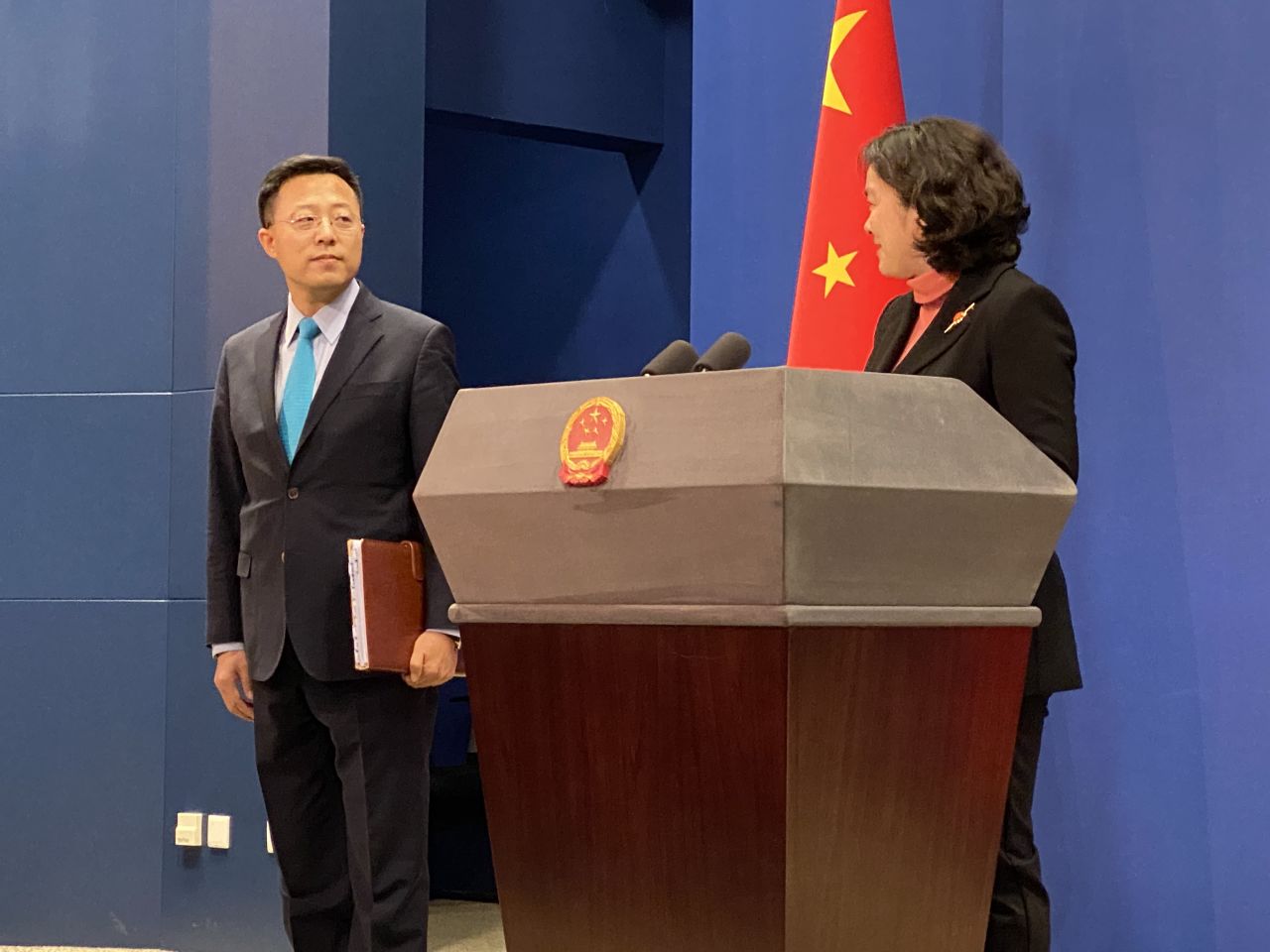 China's Ministry of Foreign Affairs newest deputy spokeman, Zhao Lijian, is seen next to the podium in Beijing. 