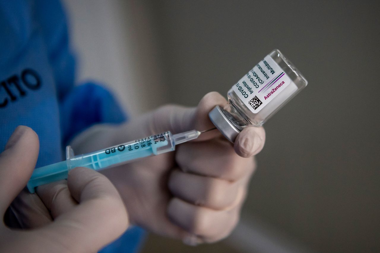 A healthcare worker prepares doses of the AstraZeneca COVID-19 vaccine on March 5 in Rome, Italy. 