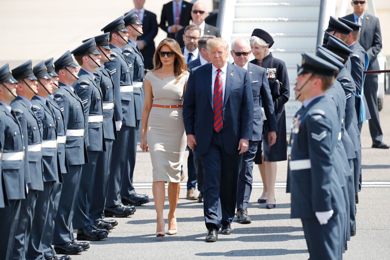 Trump and first lady Melania Trump are greeted by an honor guard of Royal Air Force personnel during their July 2018 visit to the UK