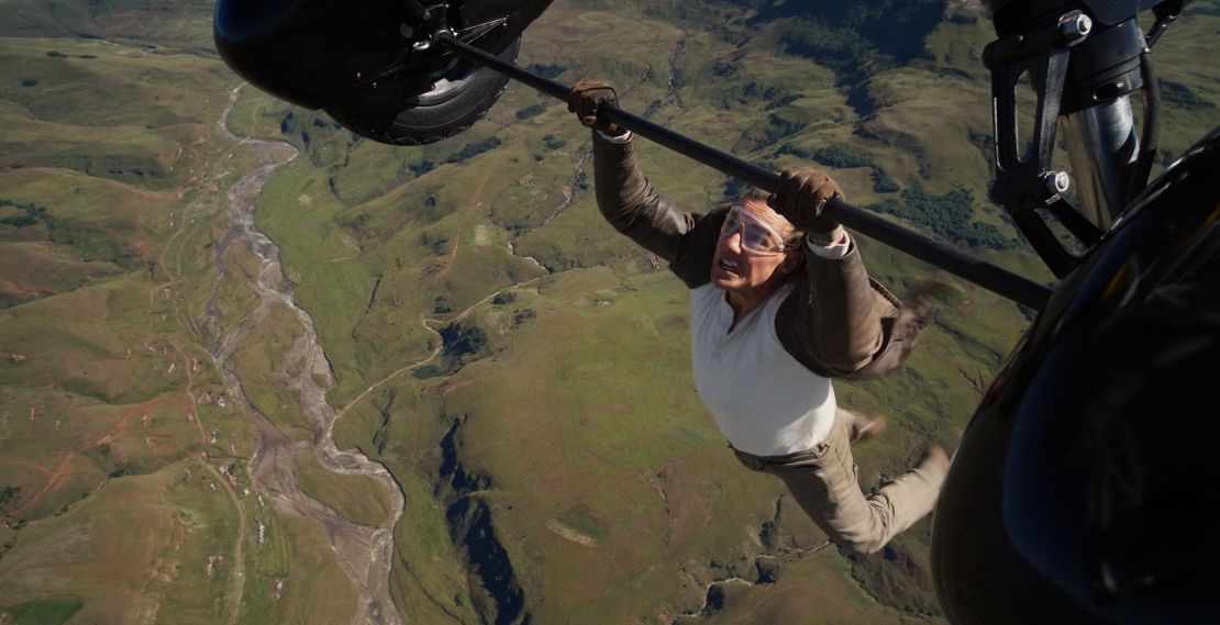 Tom Cruise hangs on for dear life as Ethan Hunt in "Mission: Impossible - The Final Reckoning."