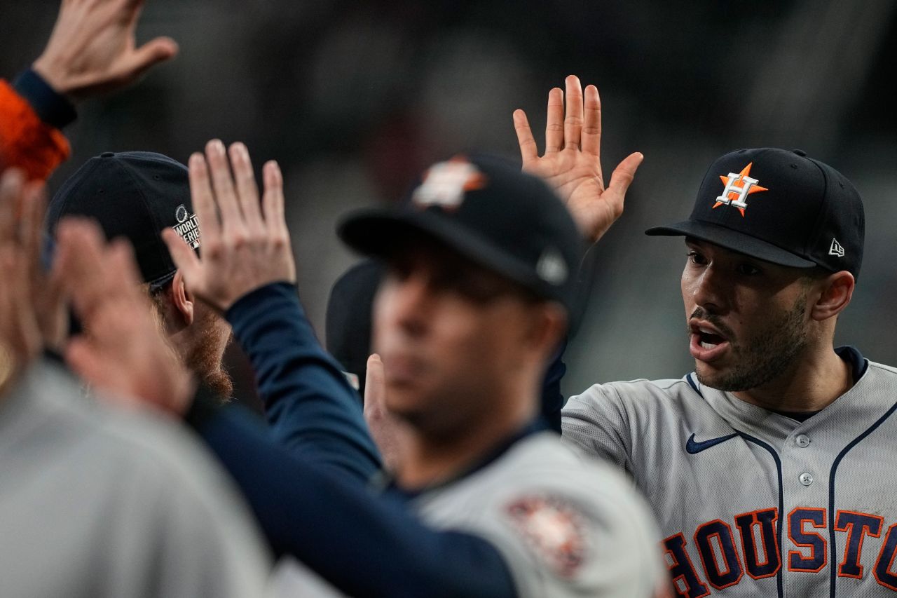 Houston Astros shortstop Carlos Correa celebrates with teammates after their win in Game 5 against the Atlanta Braves on November 1 in Atlanta. 