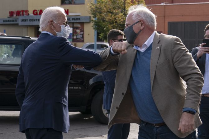 Walz greets Joe Biden as the Democratic presidential candidate arrives in Duluth, Minnesota, in September 2020.